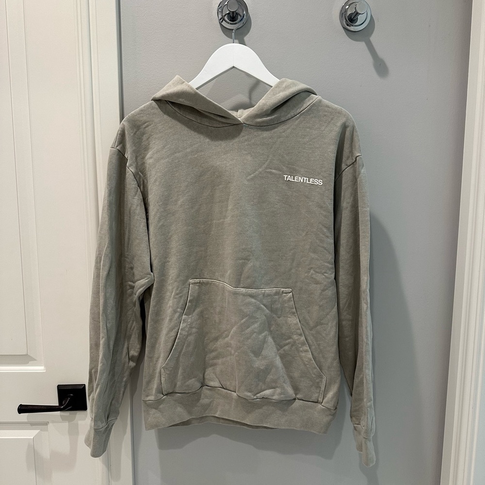 Talentless hoodie. Heavy material. Very comfy.